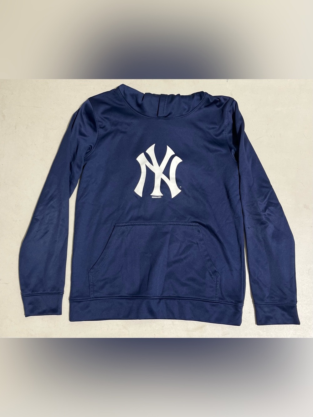 Genuine Merchandise Navy Blue Hoodie with White Label and Red Accent